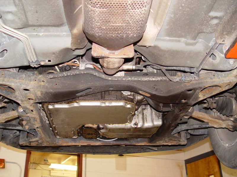 Missing Transmission to Engine Oil Pan Bracket Bolt. Car on Lift PICS